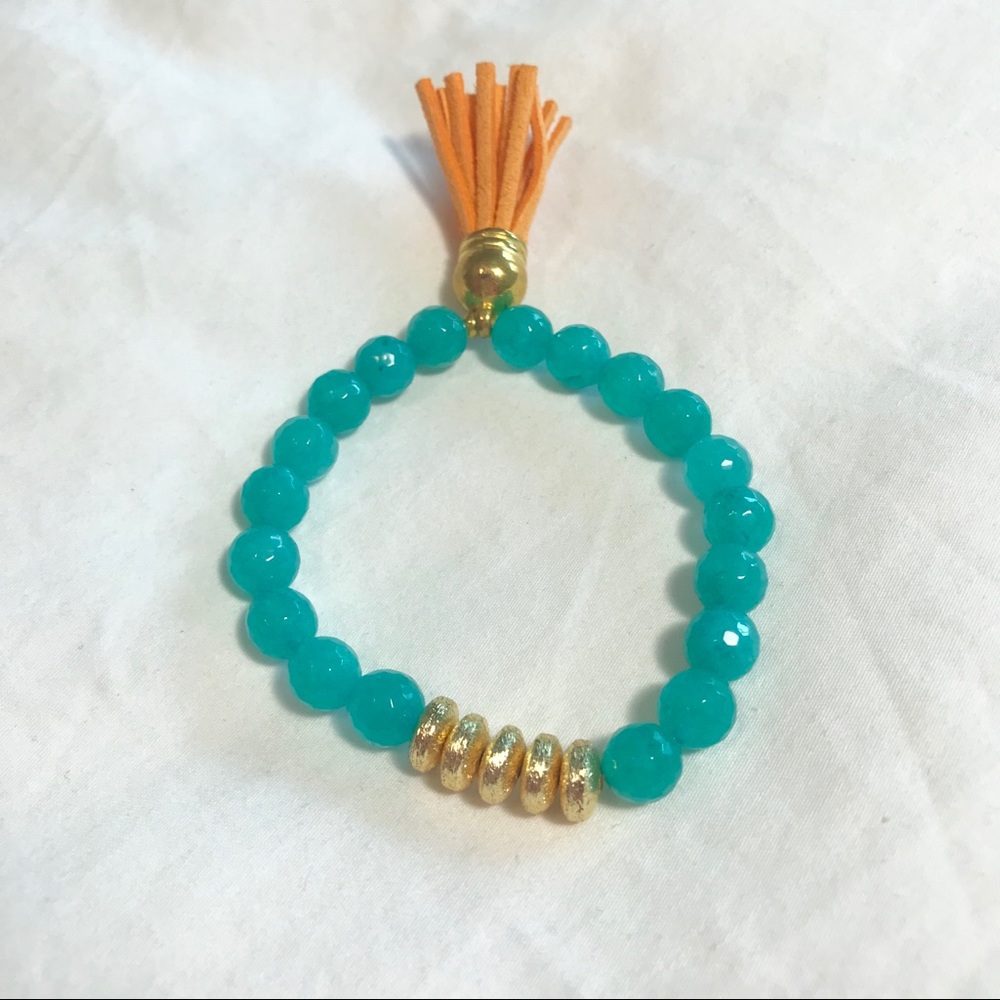 Aqua beaded bracelet with leather tassel